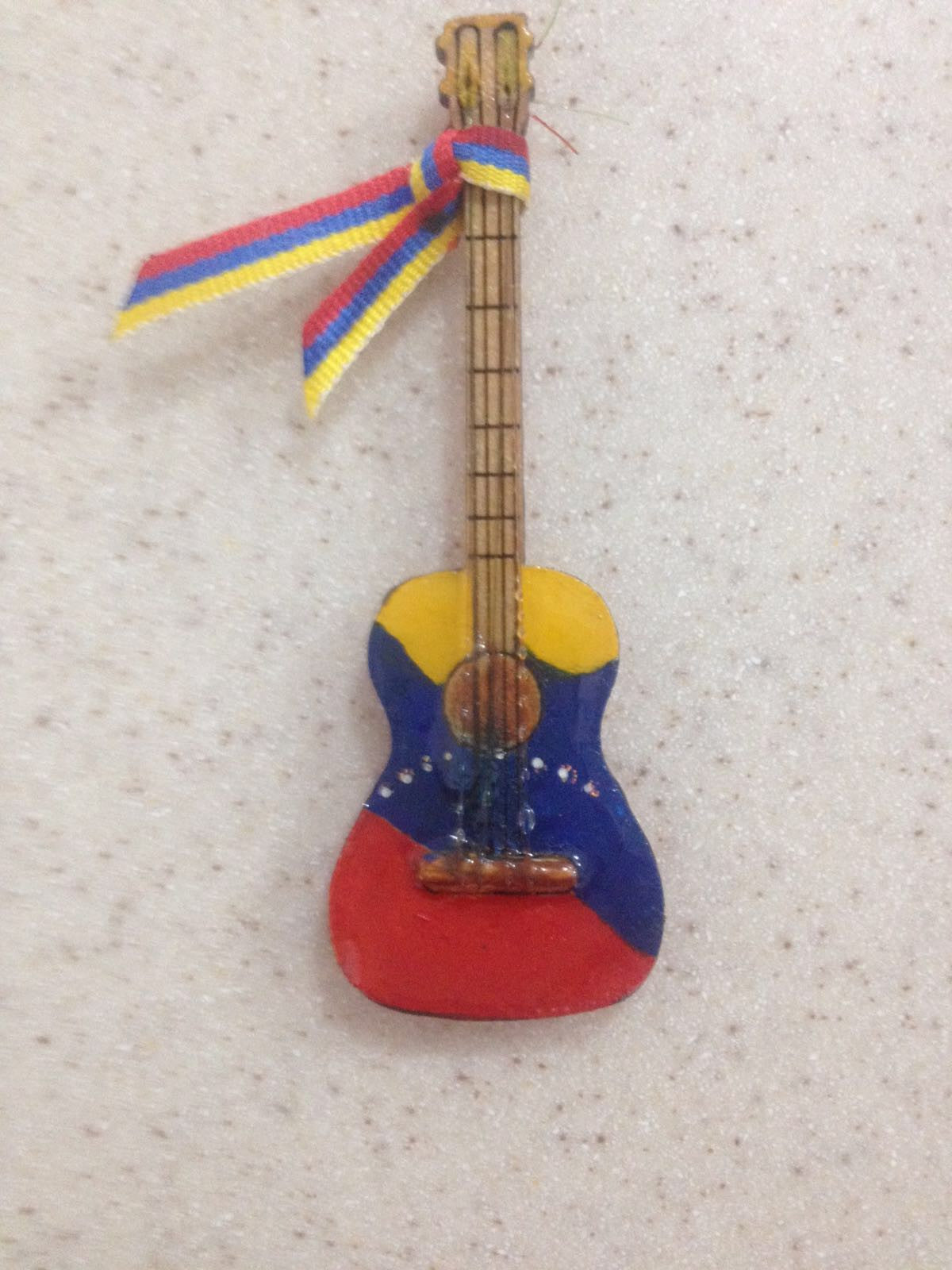 Cute and Captivating Mini Instrument Fridge Magnet painted with Venezuelan Flag