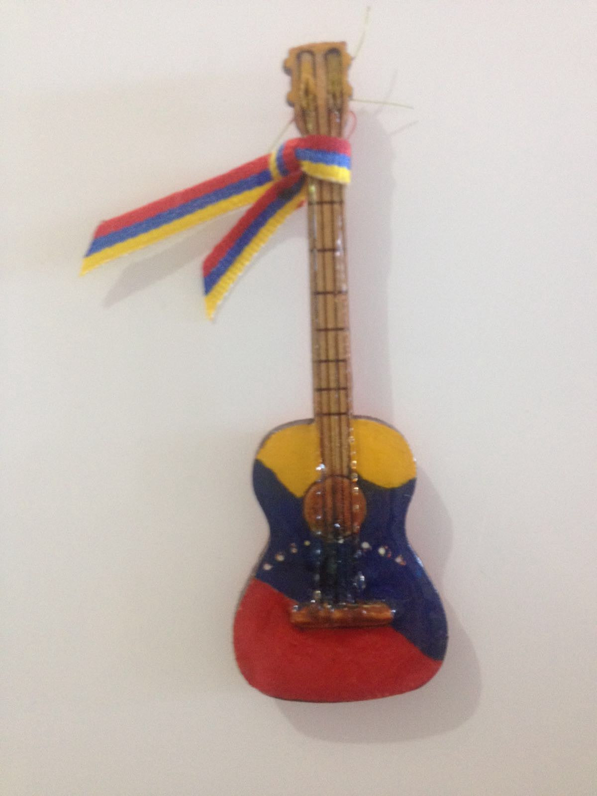 Cute and Captivating Mini Instrument Fridge Magnet painted with Venezuelan Flag