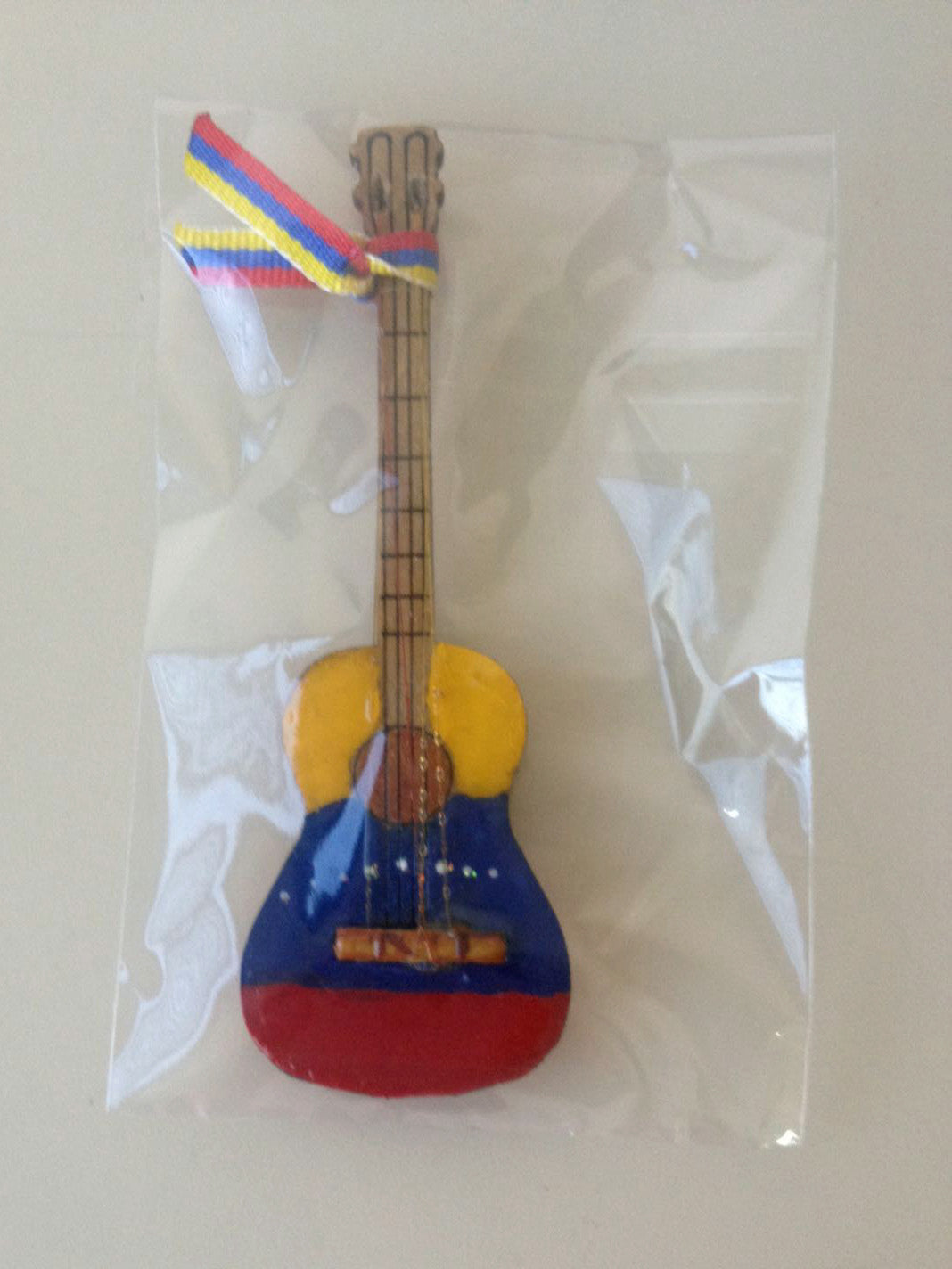 Cute and Captivating Mini Instrument Fridge Magnet painted with Venezuelan Flag